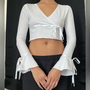 Dolls Kill Delia’s cropped white long sleeve